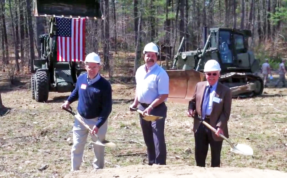 Alan Gould of A.H. Harris, left, thrives on partnerships. Here, joined by Jeffrey Spiller of Casco Bay Steel Structures, center and Peter Brissette, GM/Brand President of American Steel & Aluminum break ground on the dining hall at the Boy Scouts’ Camp William Hinds in Raymond, Maine. All parties involved, including A.H. Harris and Nox-Crete, donated material for the hall’s construction. 